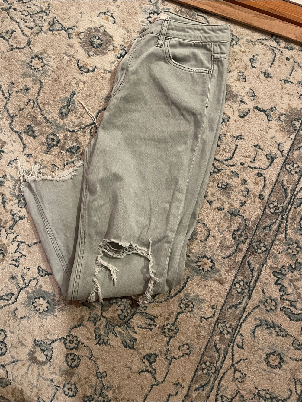 bohme High-Rise Flare Jeans in Light Olive with Distressed Hem